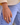 Billedet viser en hvid Cuesta ring med en elegant, minimalistisk design. Ringen har en glat overflade og er lavet af et skinnende materiale, der fremhæver dens enkle skønhed.