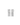 Billedet viser et par sølvøreringe med et elegant og moderne design. Øreringene har en glat, poleret overflade og en geometrisk form, der giver et stilfuldt udtryk.